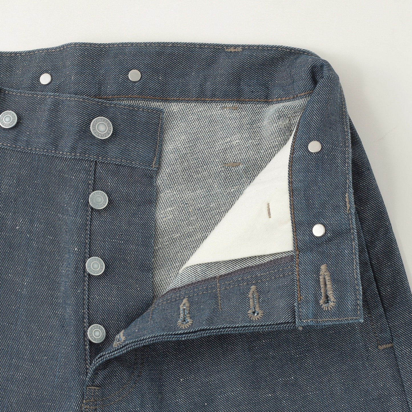 GREY CAST DENIM TROUSERS