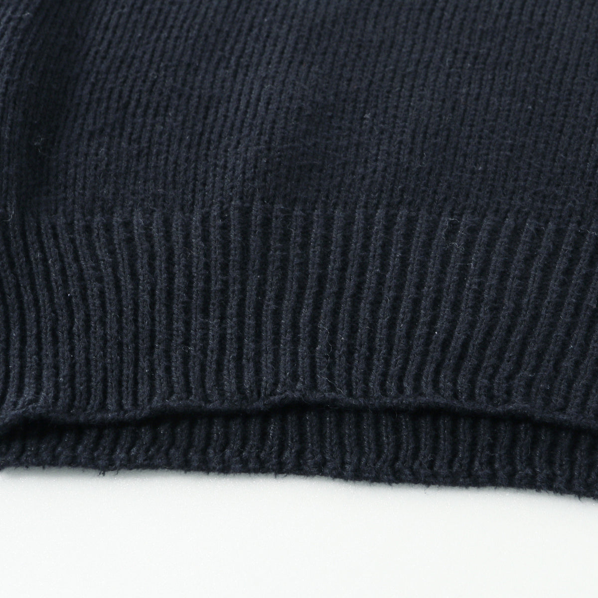 CAST OFF ROLL NECK KNIT