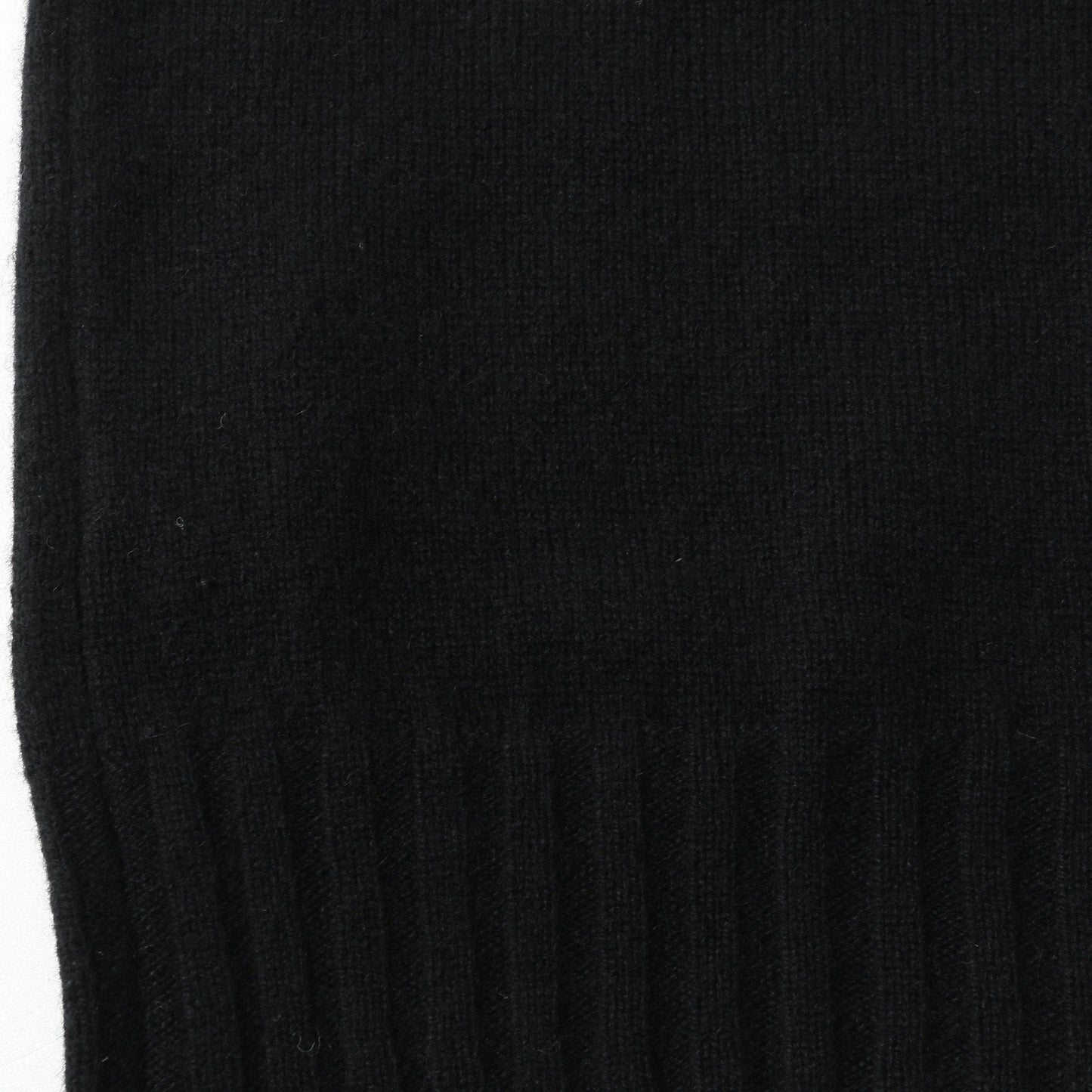 SLEEVELESS ROLL NECK KNIT