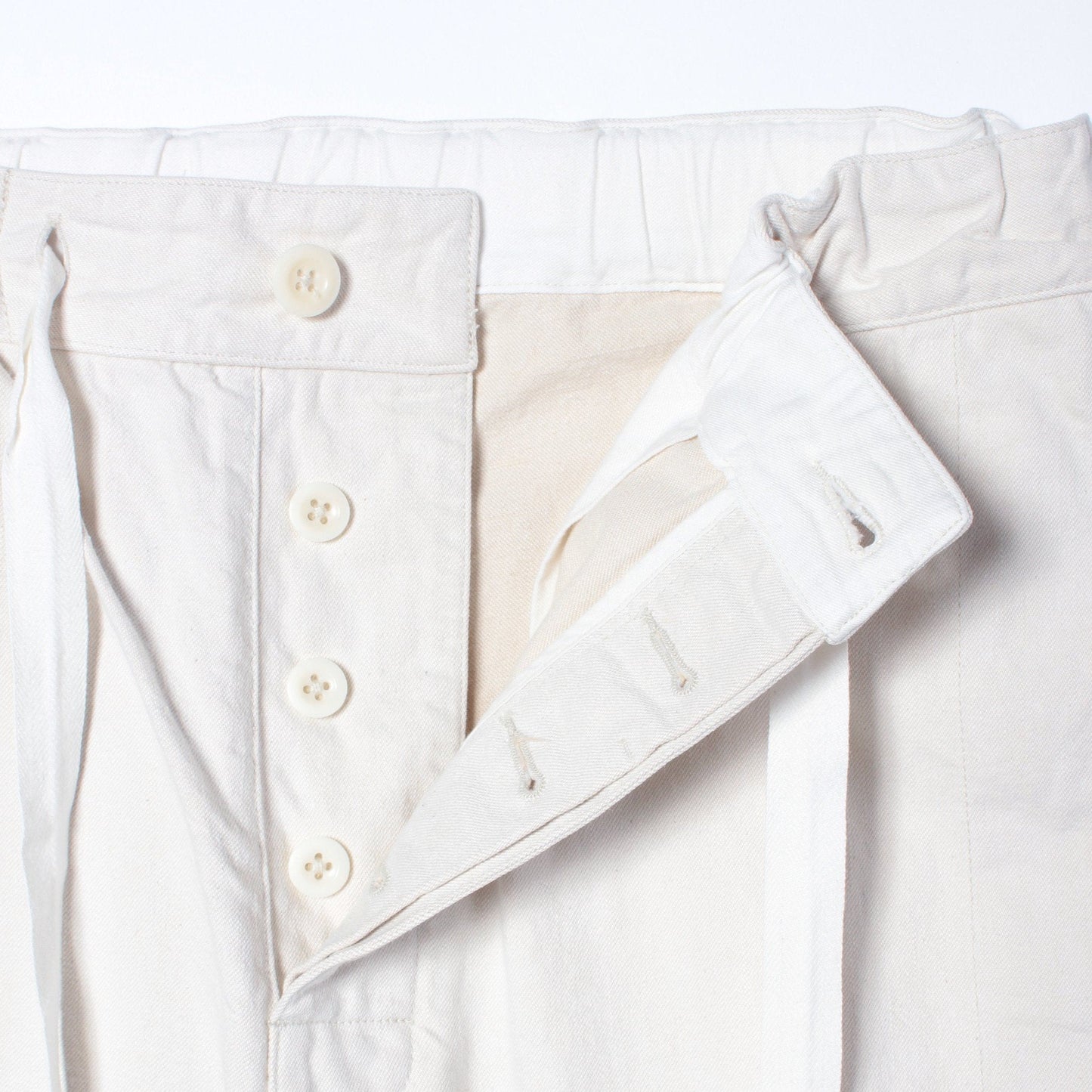 NATURAL DENIM TROUSERS
