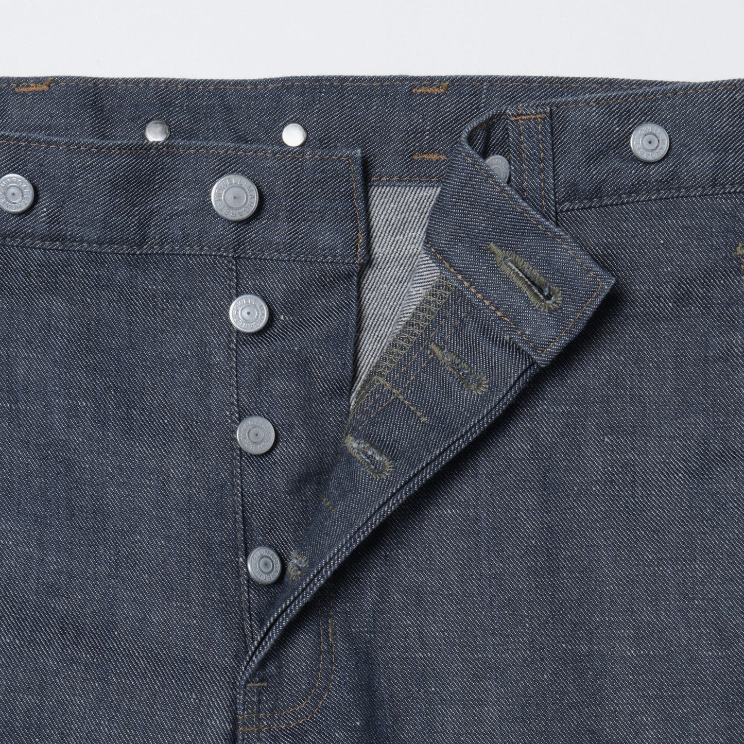 GREY CAST DENIM TROUSERS
