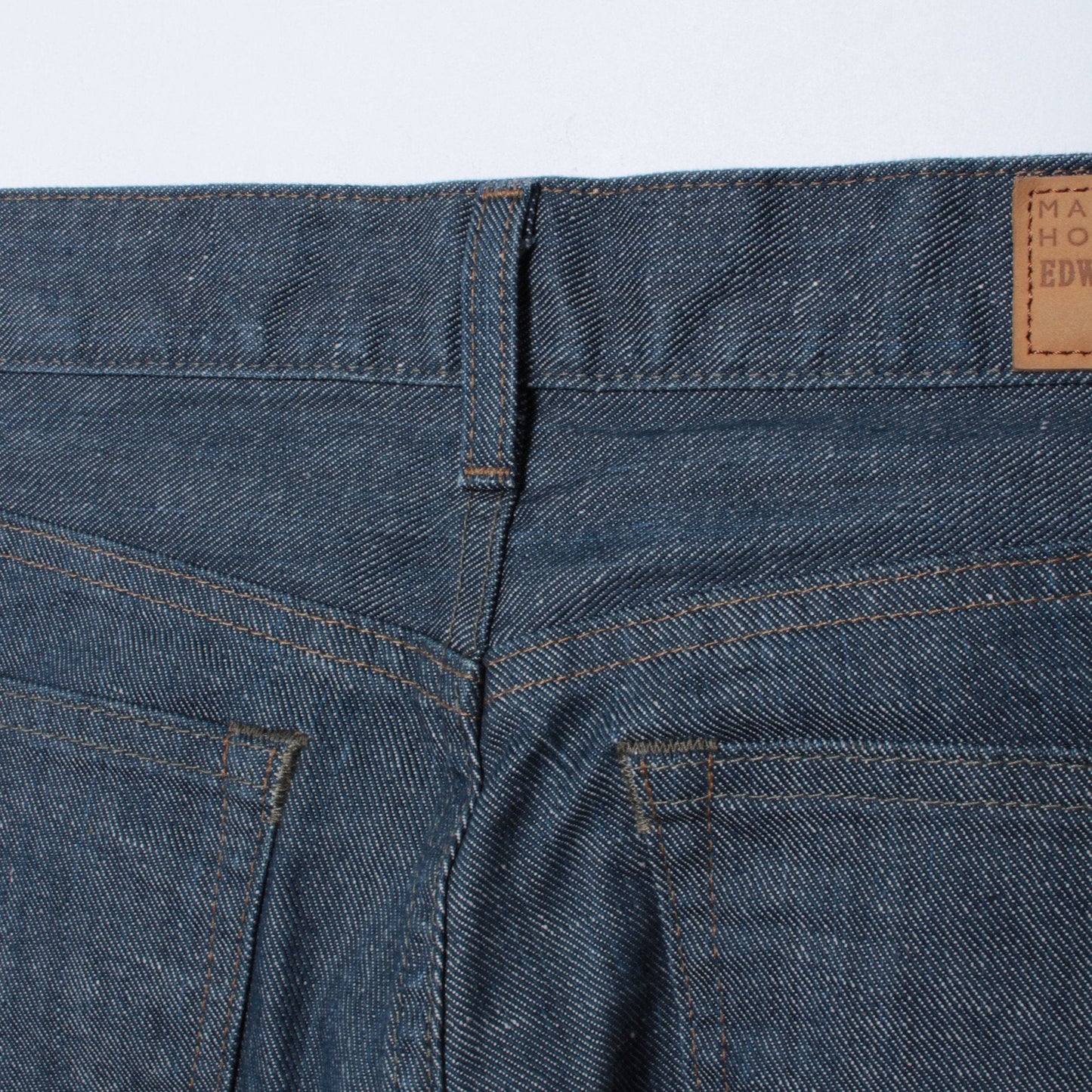 GREY CAST DENIM TROUSERS