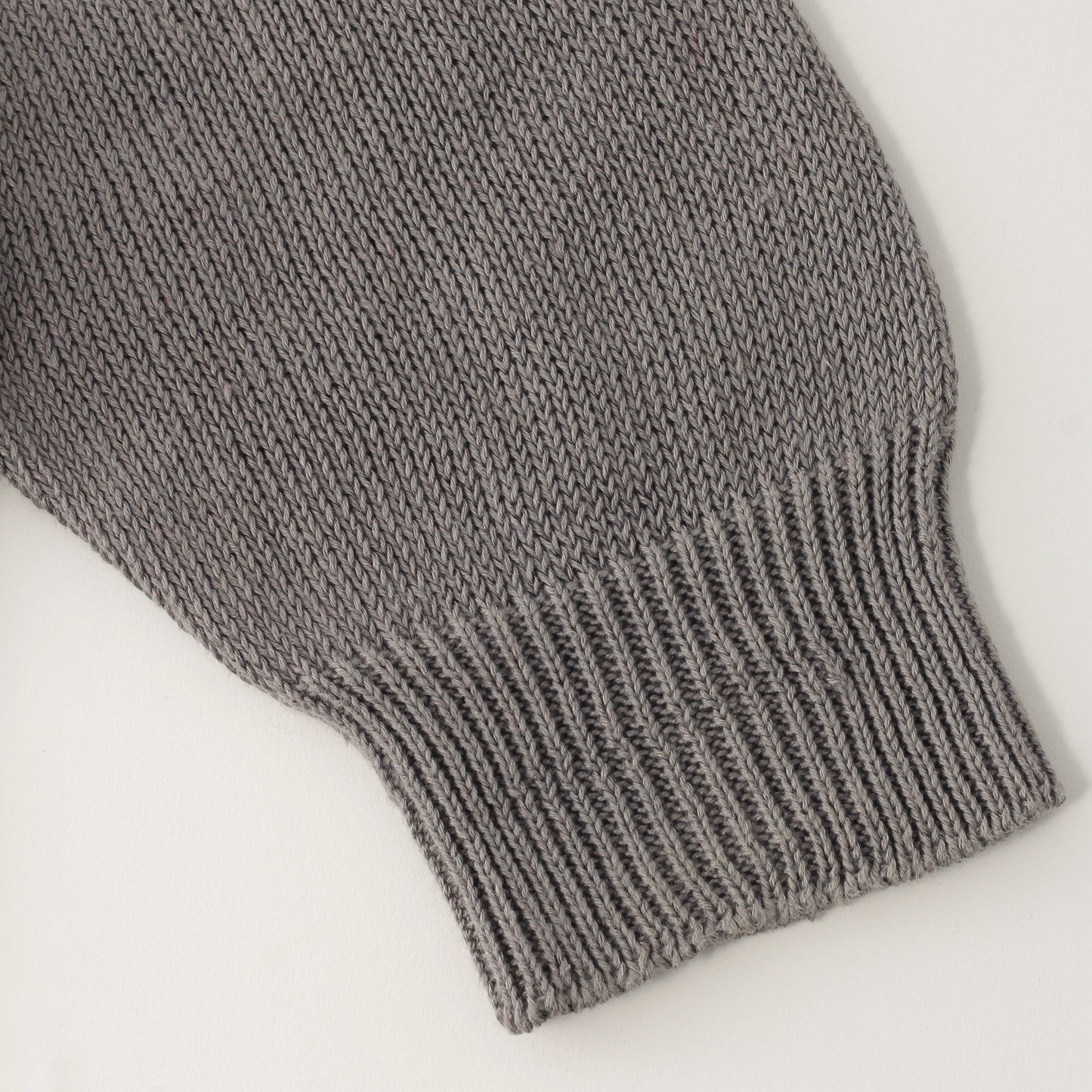 CAST OFF ROLL NECK KNIT