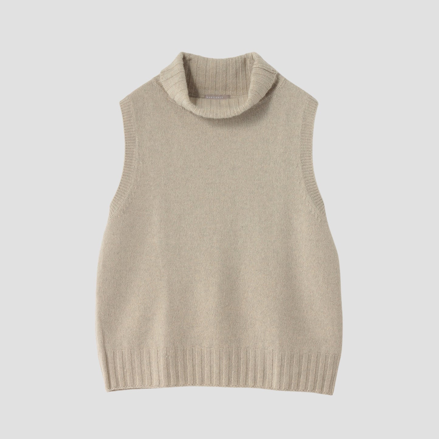 SLEEVELESS ROLL NECK KNIT