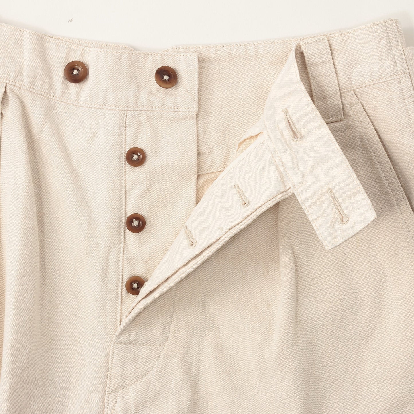 NATURAL DENIM TROUSERS