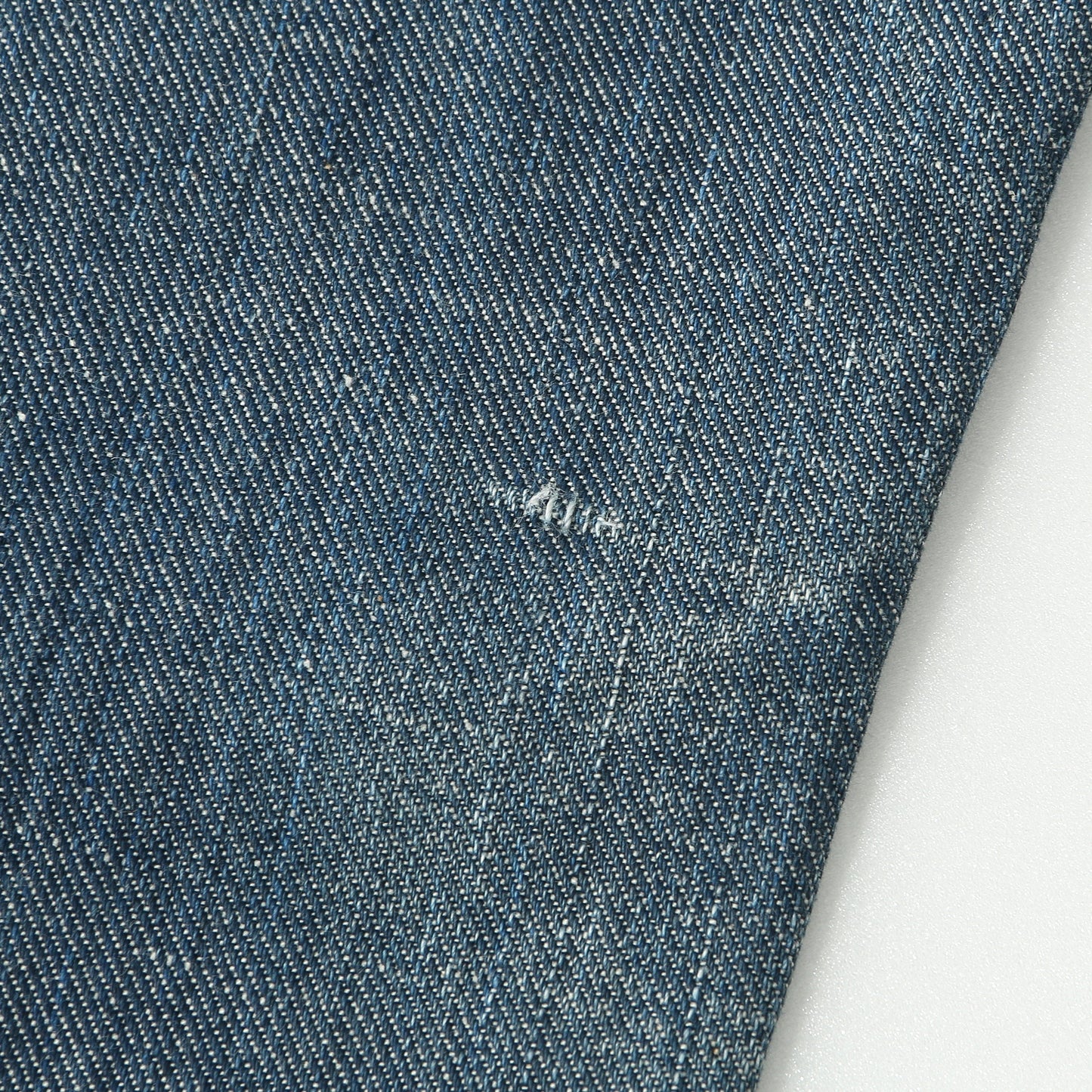 GREY CAST DENIM TROUSERS