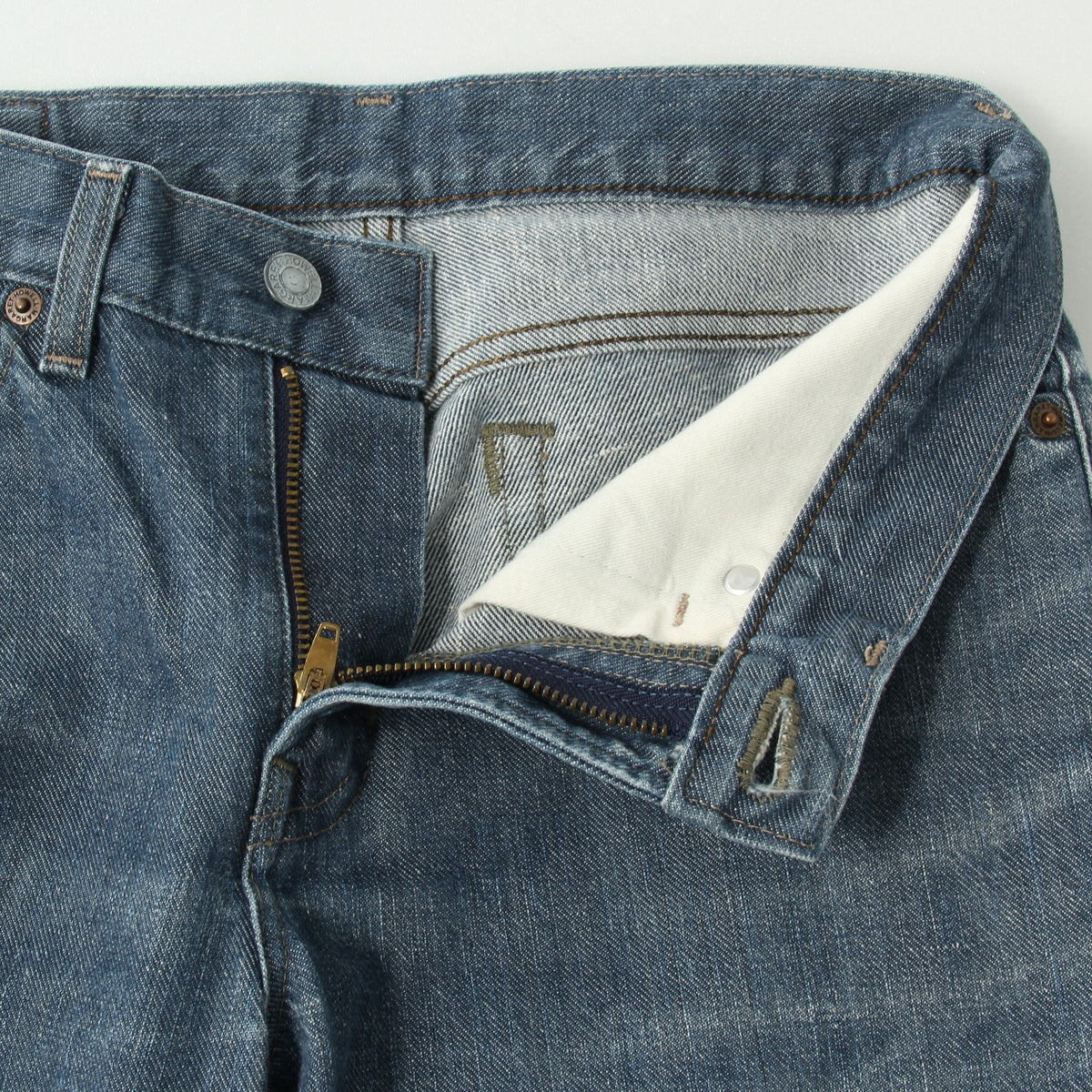 GREY CAST TROUSERS