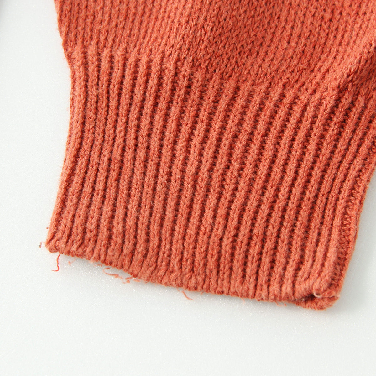 CAST OFF ROLL NECK KNIT