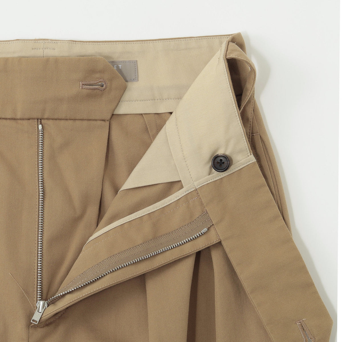WORN COTTON GABARDINE TROUSERS