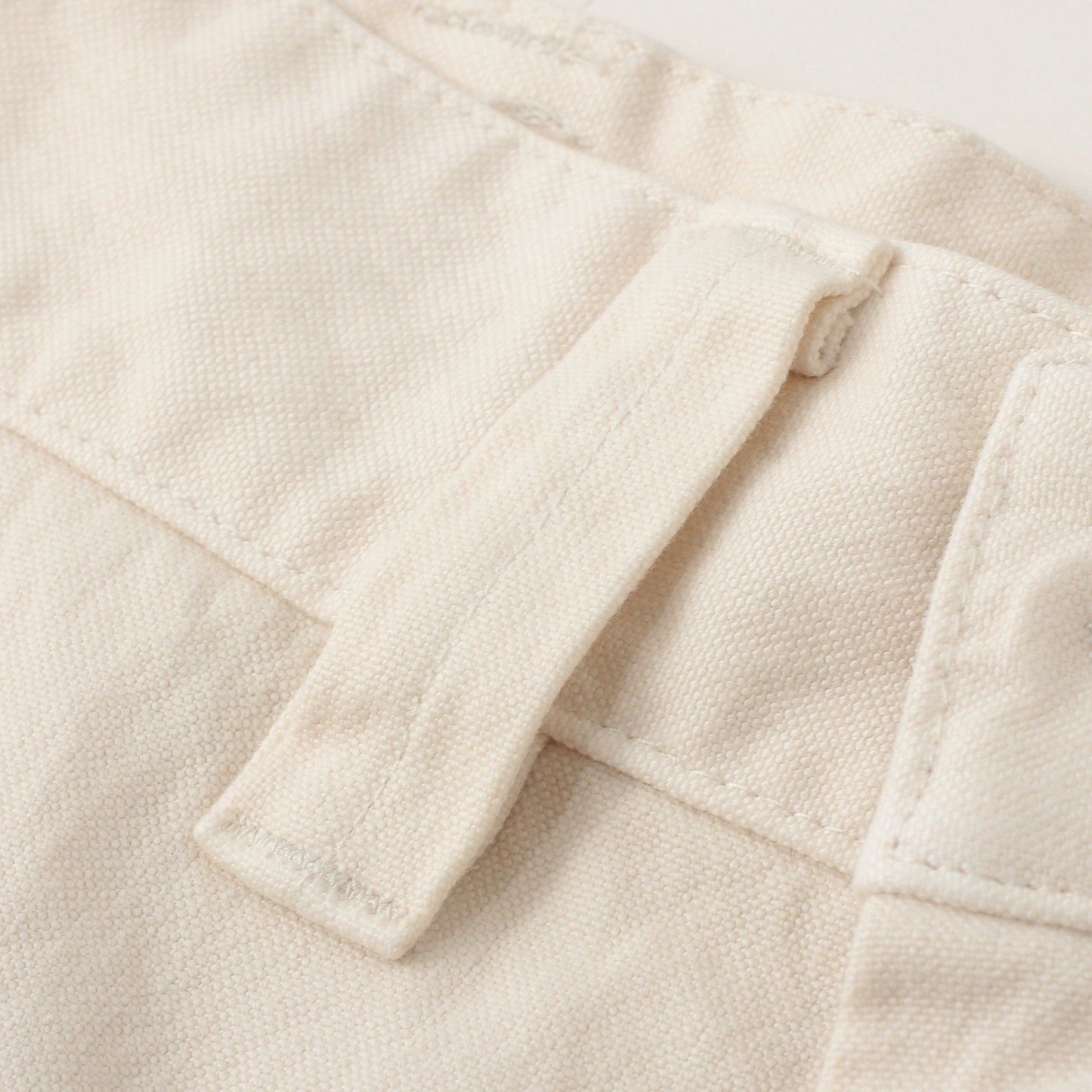 UNEVEN COTTON CANVAS TROUSERS