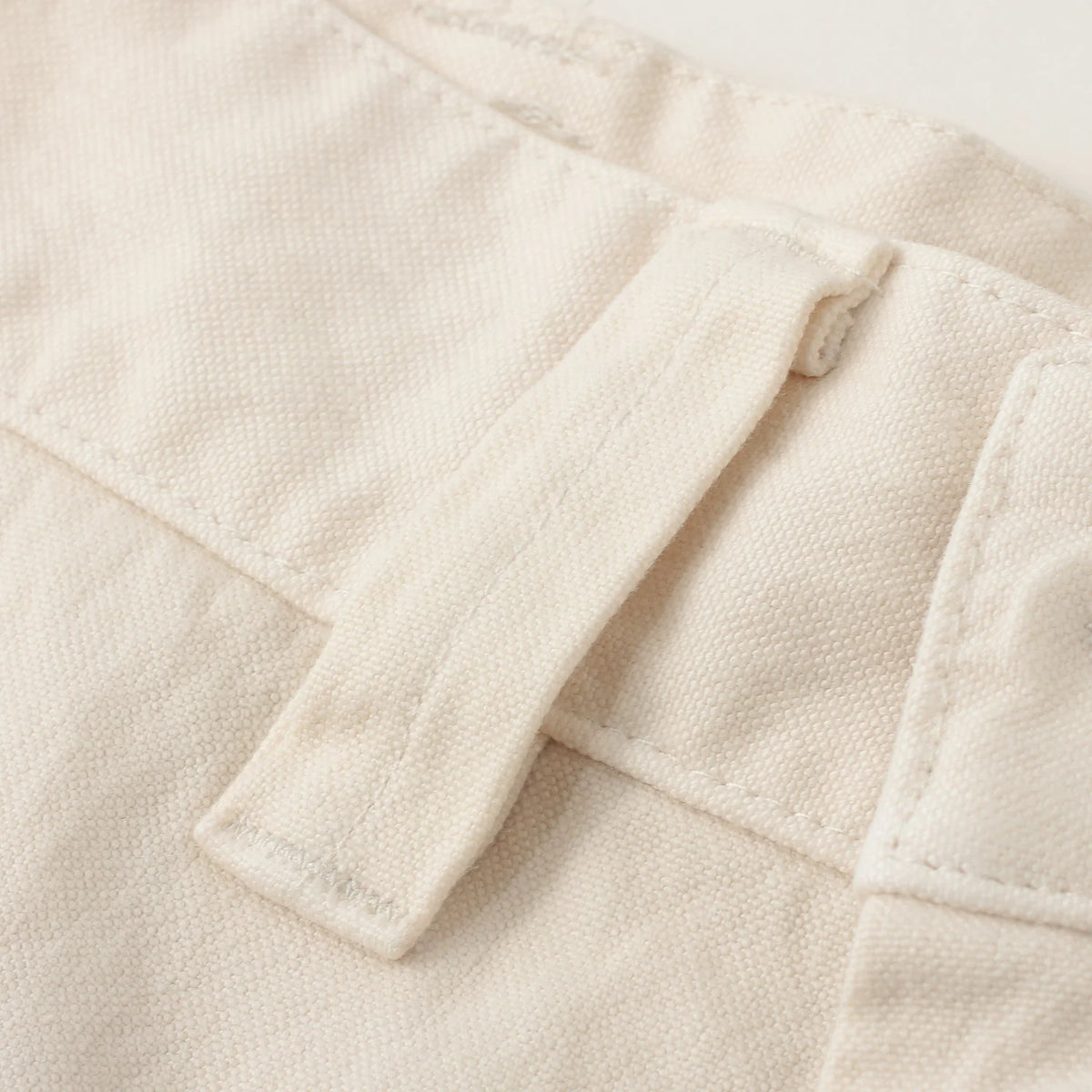 UNEVEN COTTON CANVAS TROUSERS