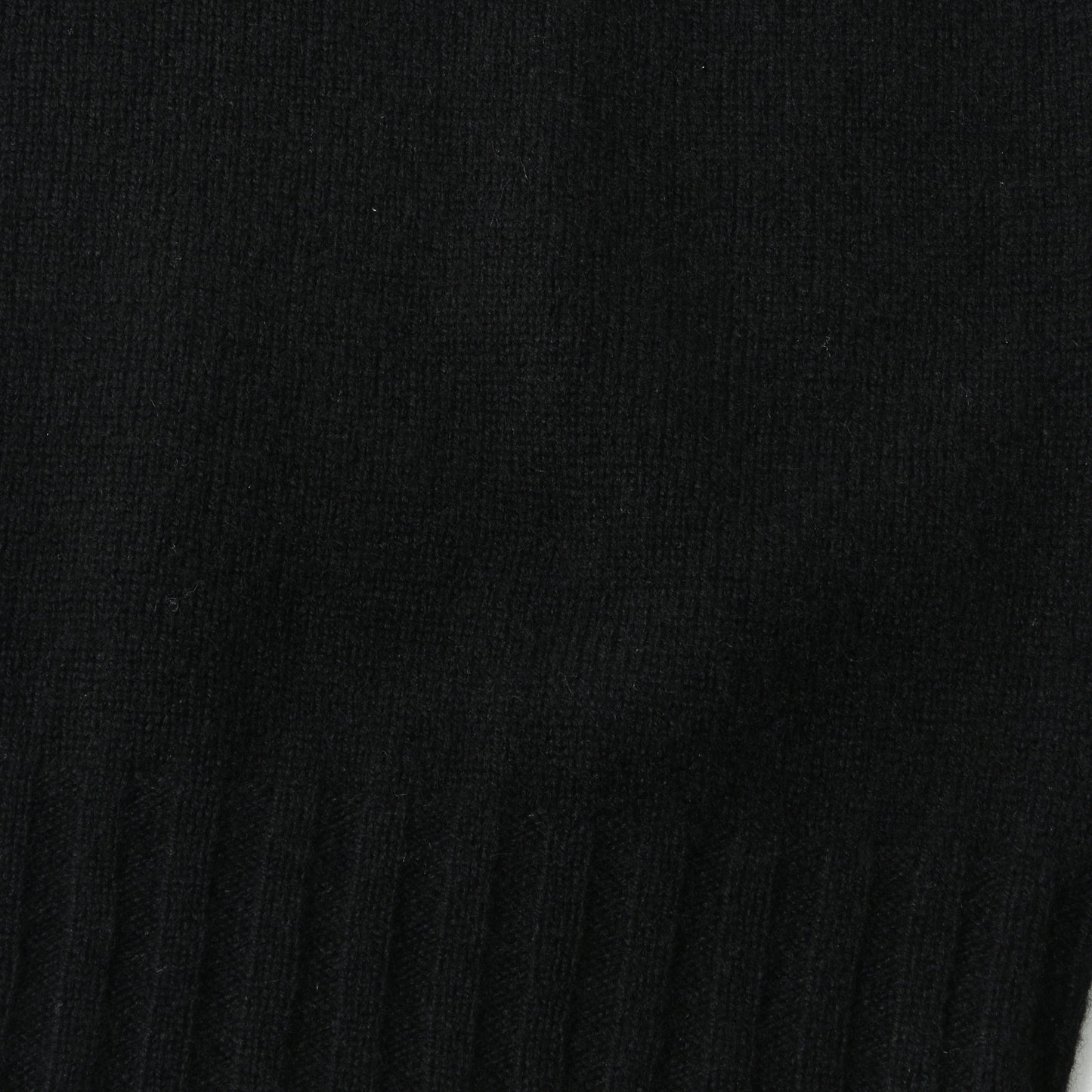 SLEEVELESS ROLL NECK KNIT