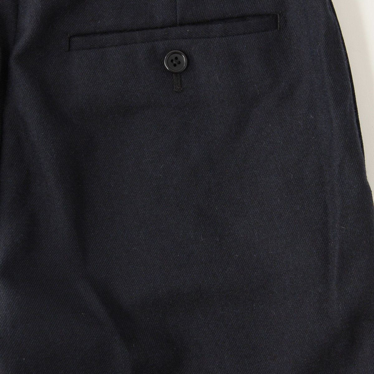 WASHED WOOL SERGE TROUSERS