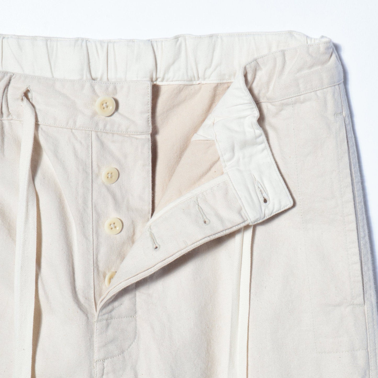 NATURAL DENIM TROUSERS