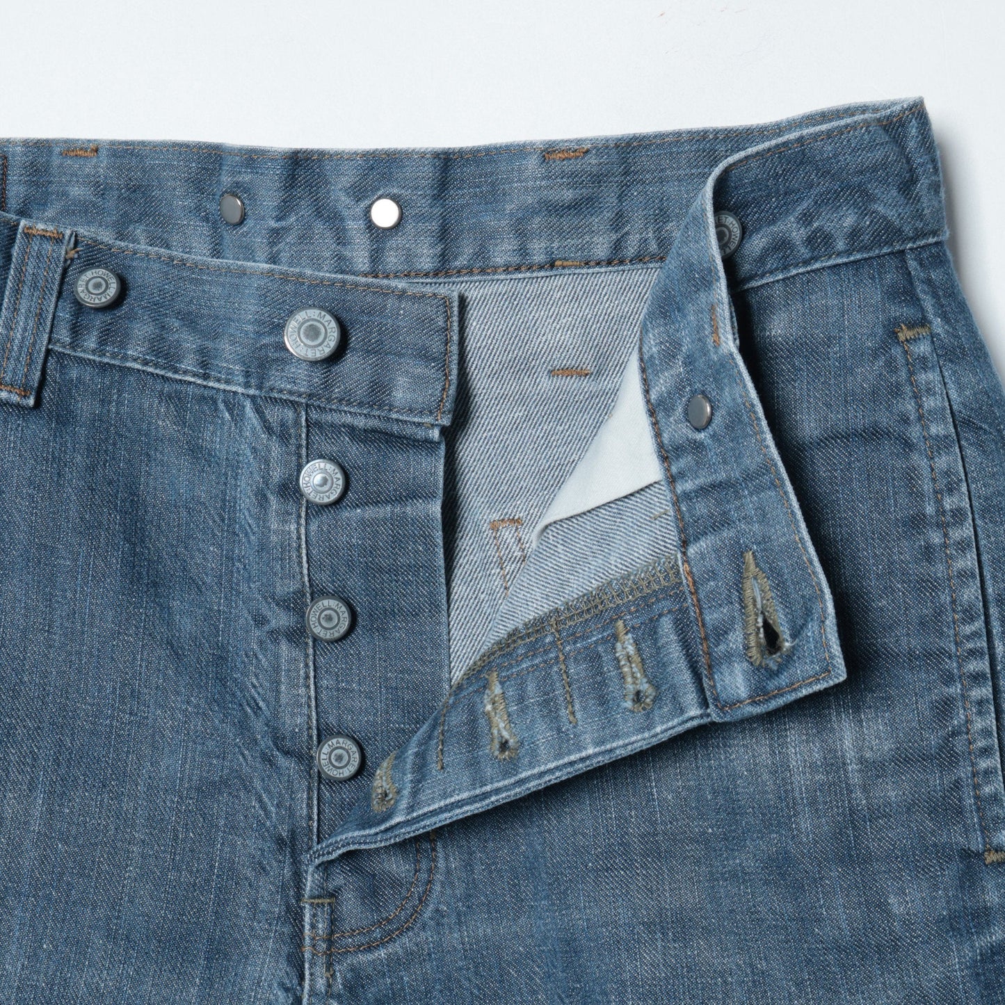 GREY CAST DENIM TROUSERS