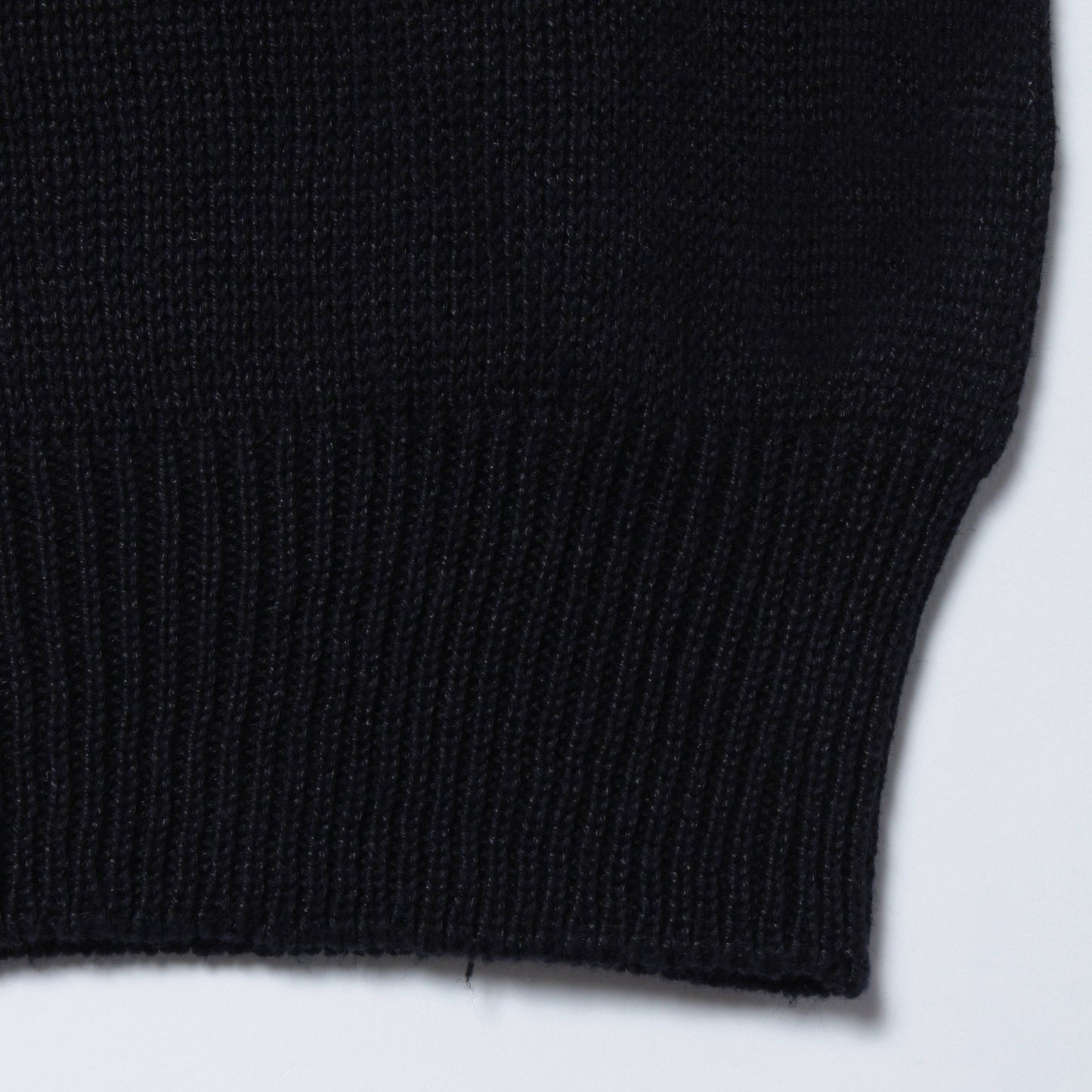 CAST OFF ROLL NECK KNIT