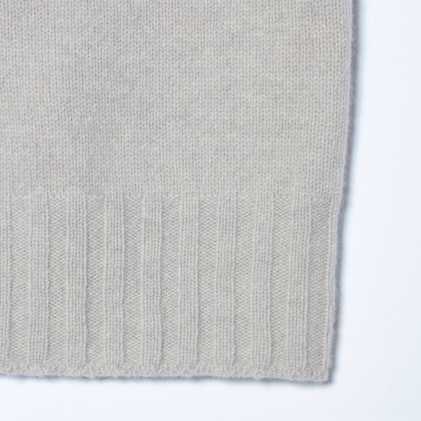SLEEVELESS ROLL NECK KNIT