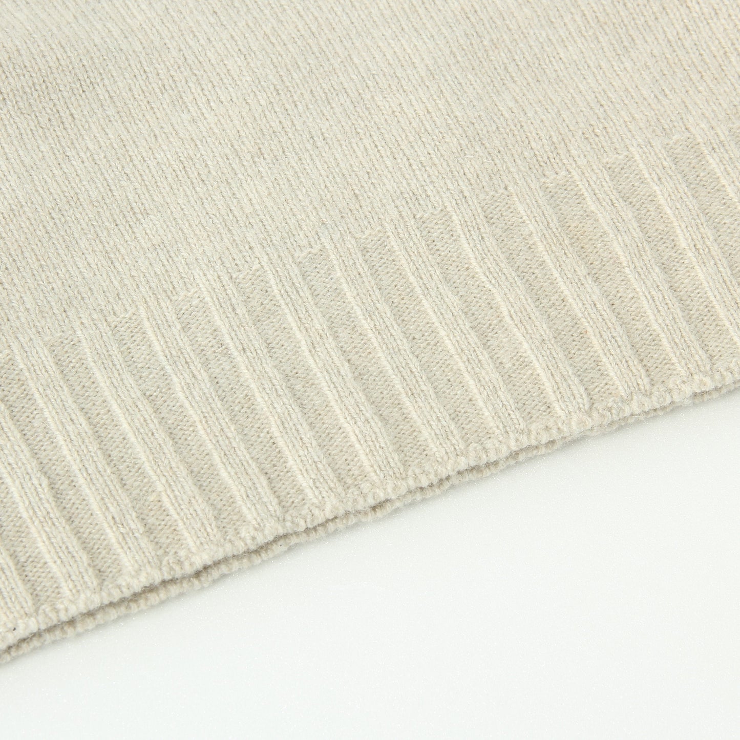 SLEEVELESS ROLL NECK KNIT