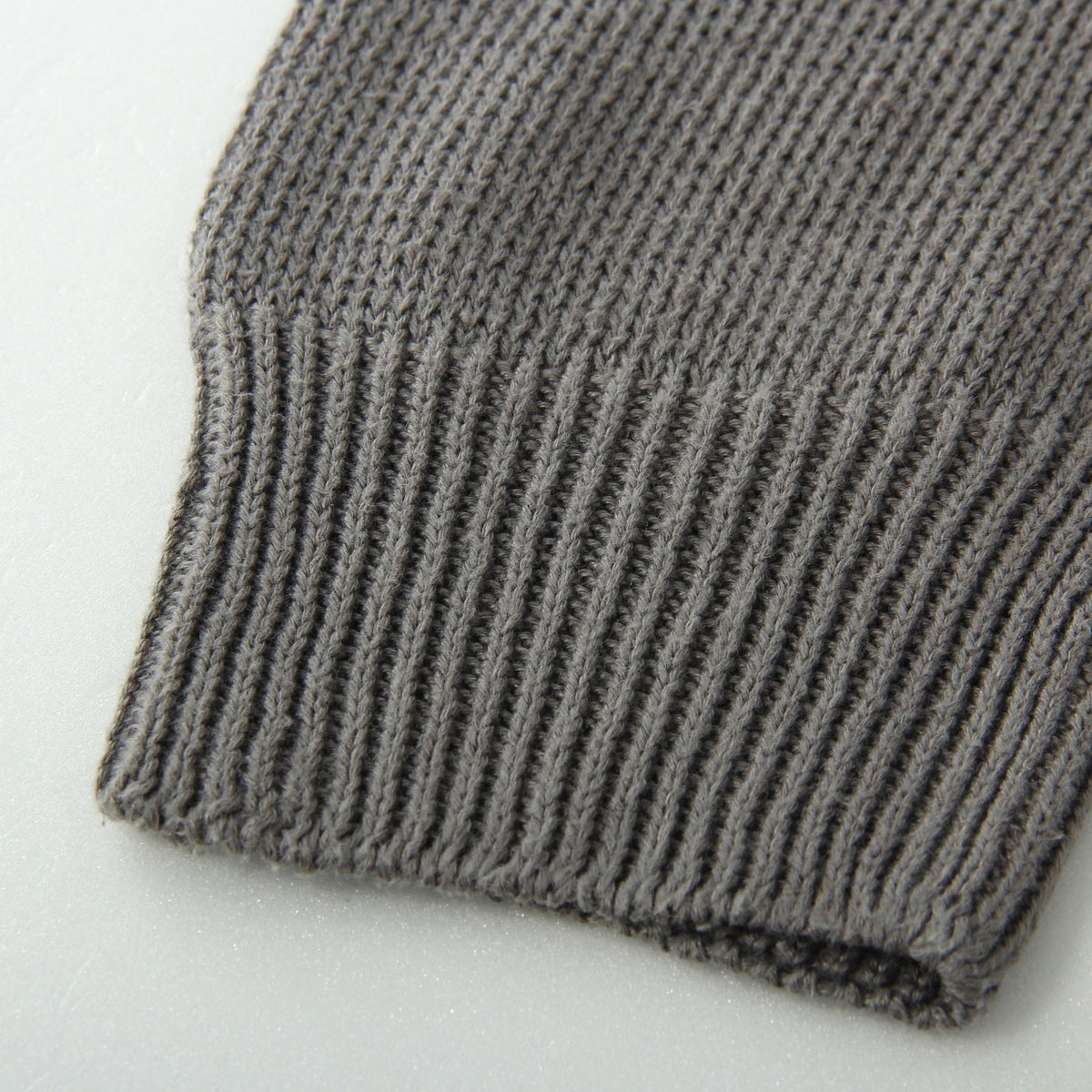 CAST OFF ROLL NECK KNIT