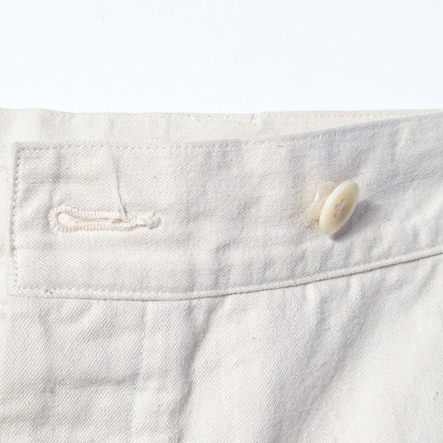 NATURAL DENIM TROUSERS