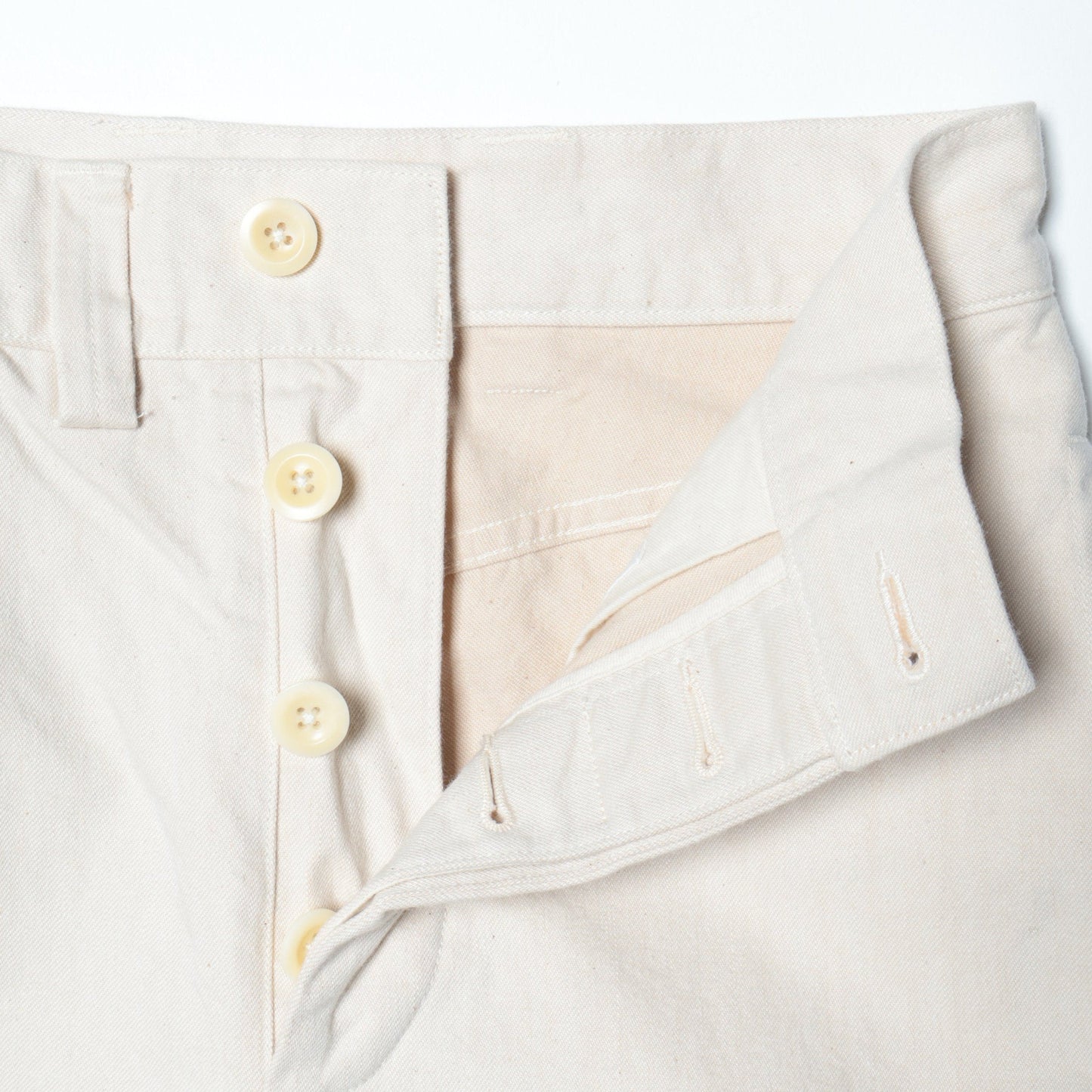 NATURAL DENIM TROUSERS