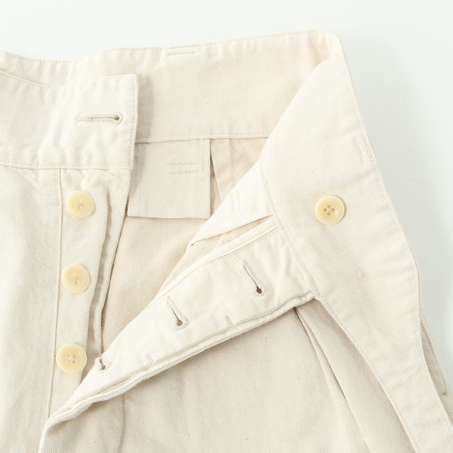 NATURAL DENIM TROUSERS