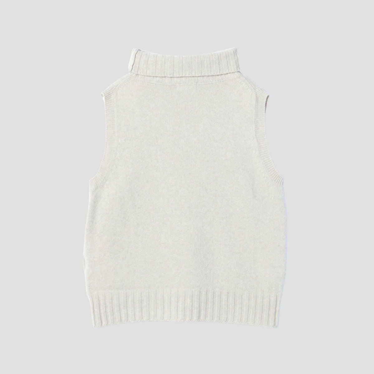 SLEEVELESS ROLL NECK KNIT