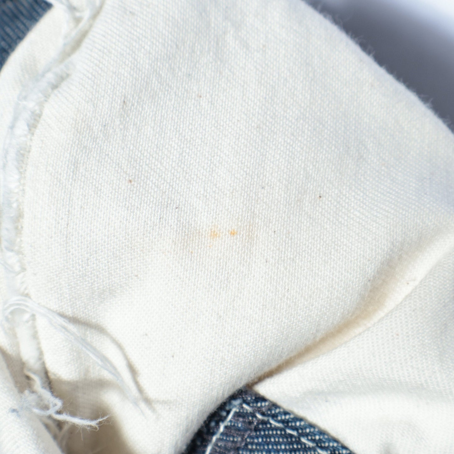 GREY CAST DENIM TROUSERS
