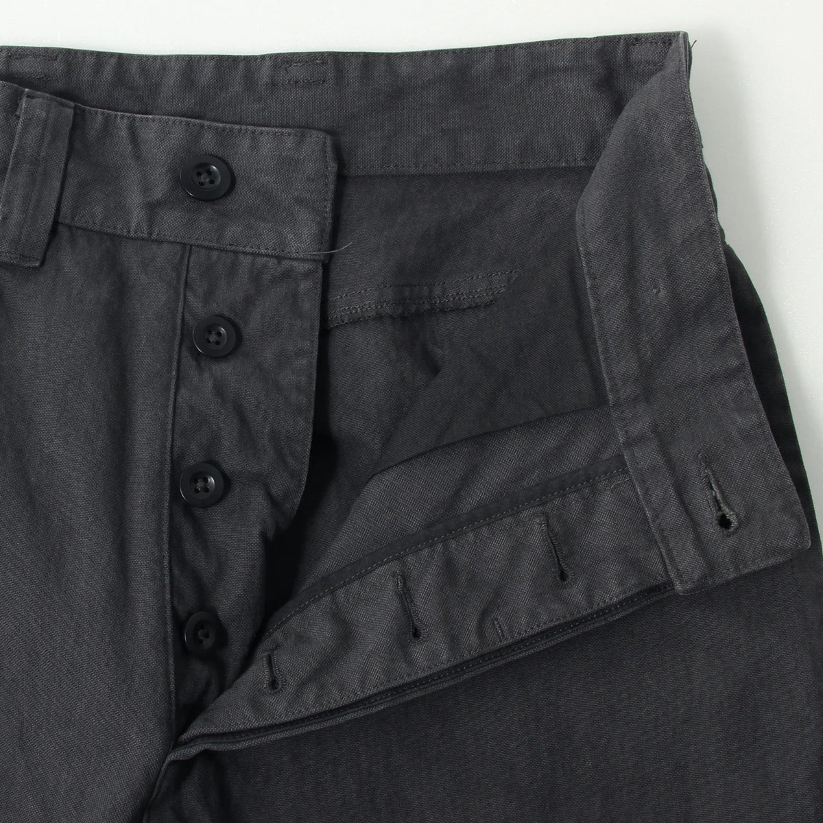 UNEVEN COTTON CANVAS TROUSERS