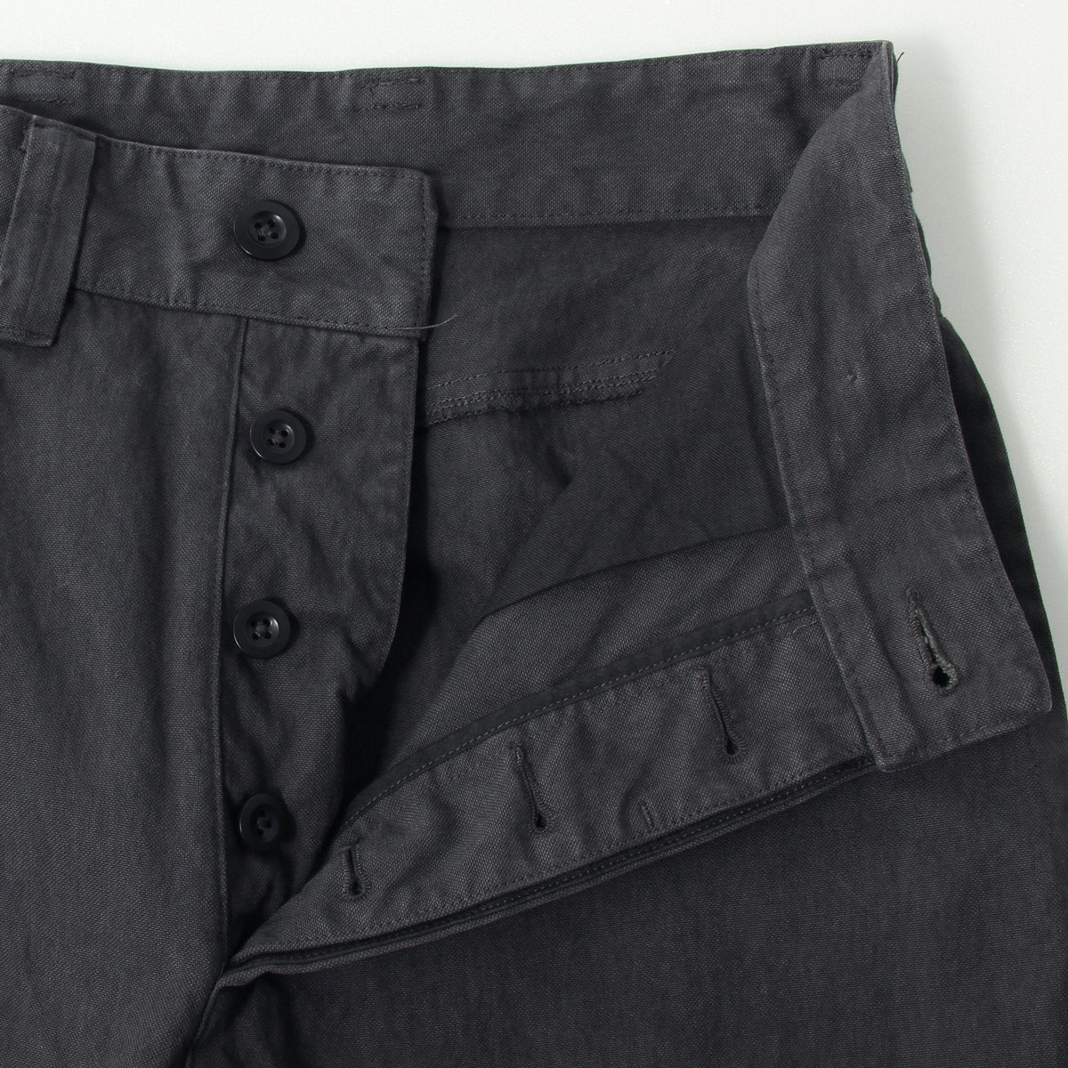 UNEVEN COTTON CANVAS TROUSERS